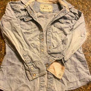 A light weight soft denim like material snap buttons long sleeves No damage